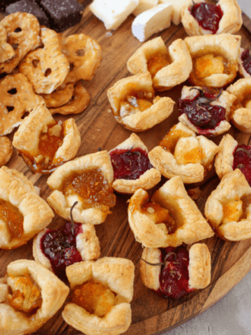 jam and brie bites on charcuterie board