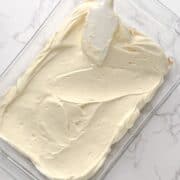 cheesecake filling on top of a crescent roll.