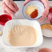 Mixing the yum yum sauce together.