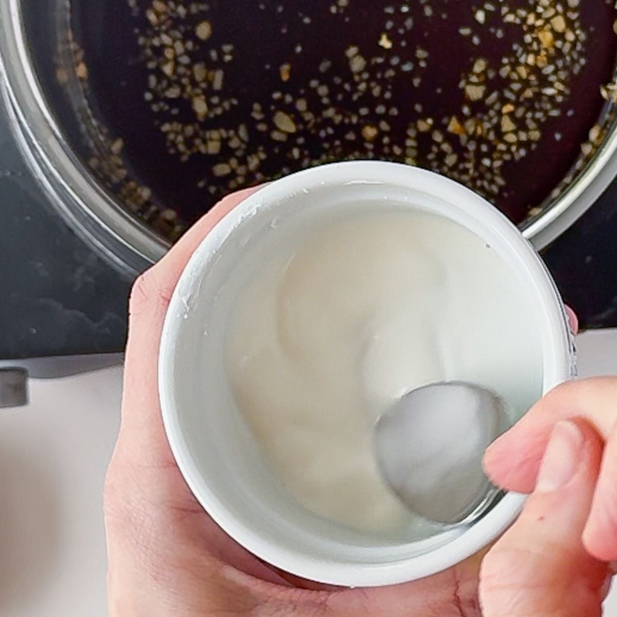 Adding the slurry into the other ingredients.