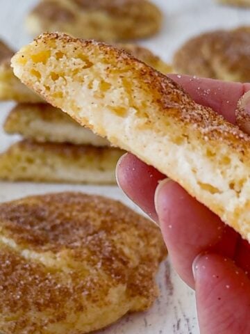 Churro cheesecake cookie in half.