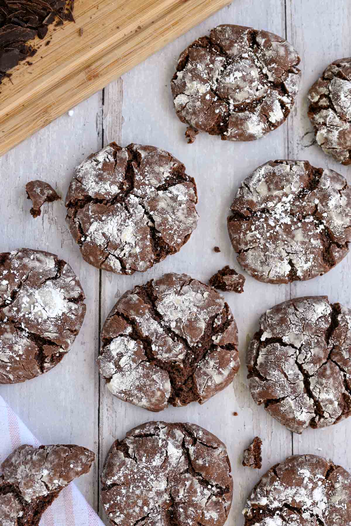 Chocolate crinkle cookies on a table.