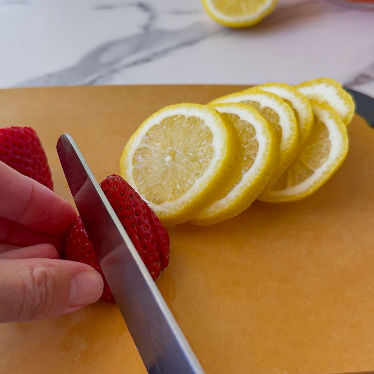 Slicing the fruit.