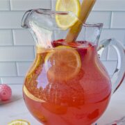 Mixing the eater punch in a pitcher.