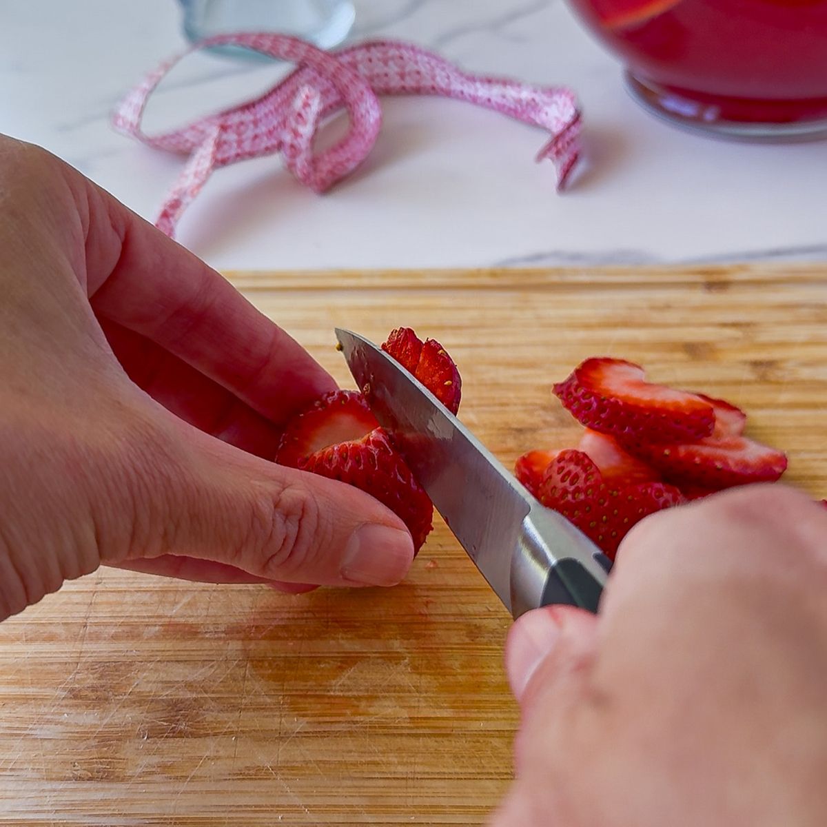 Cut the strawberries into hearts.