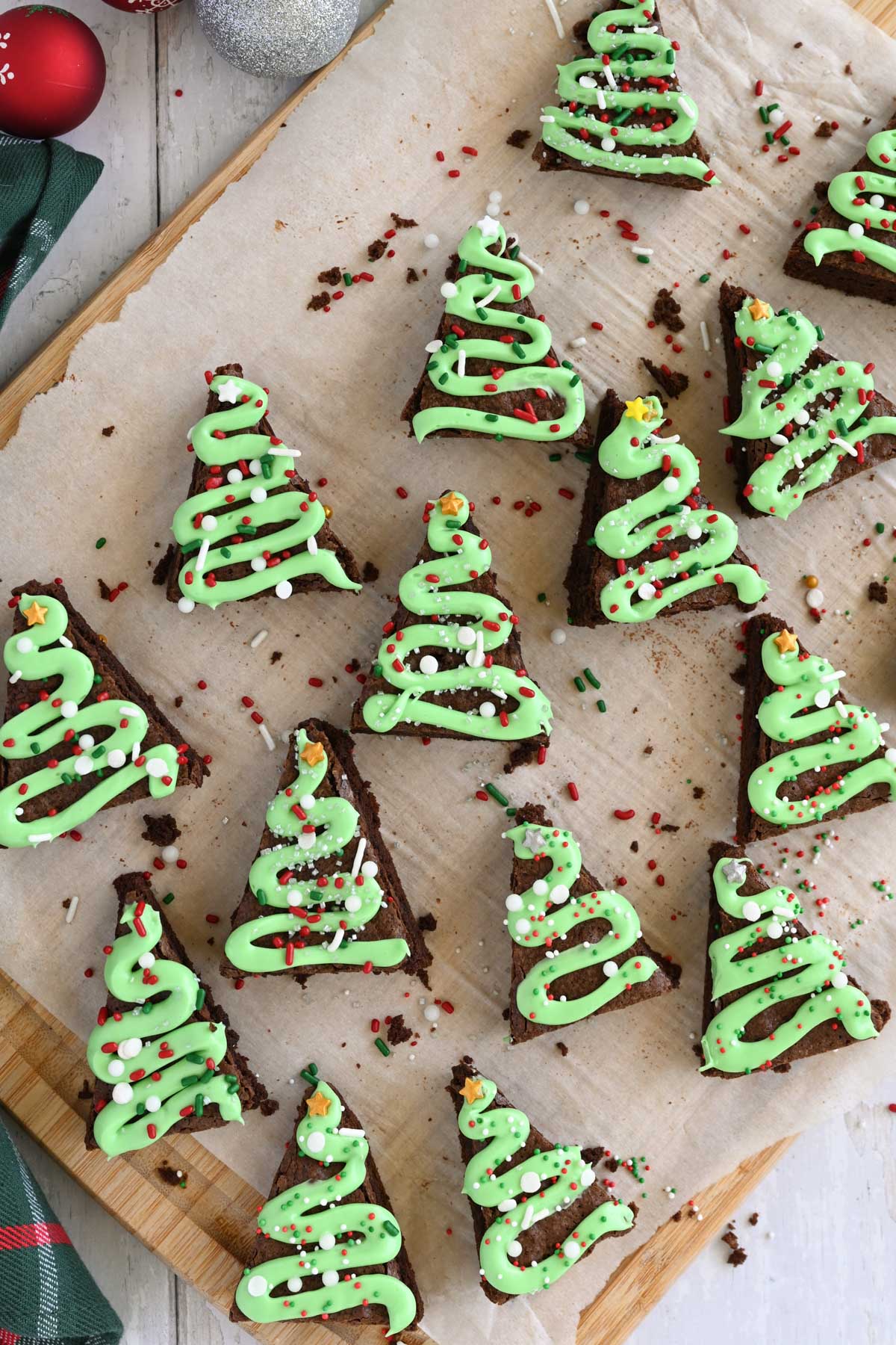 Christmas brownies on parchment paper.