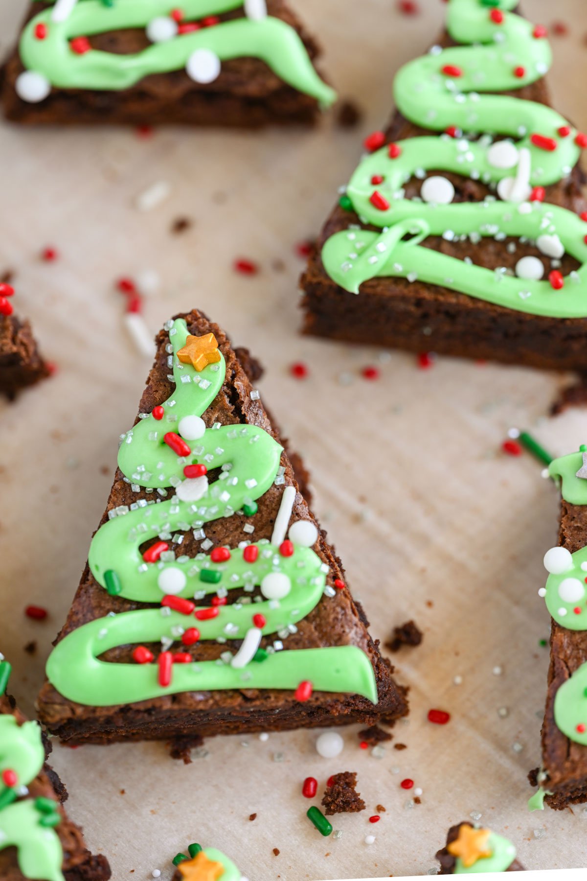 Christmas brownies on parchment paper.