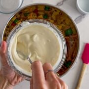 Melting the white chocolate.