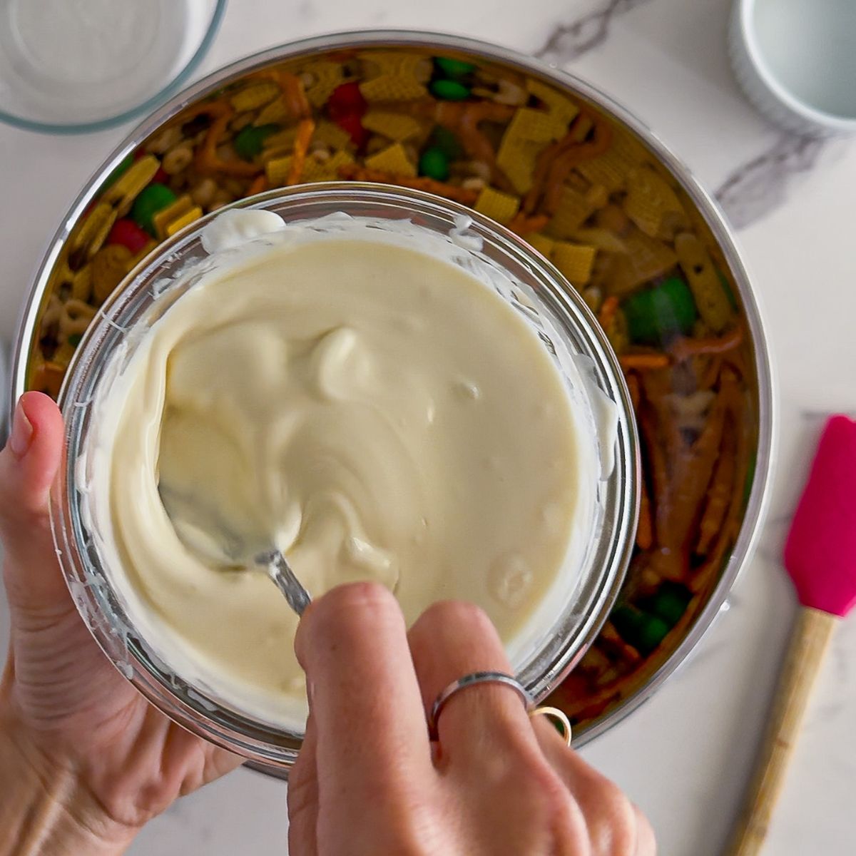 Melting the white chocolate.
