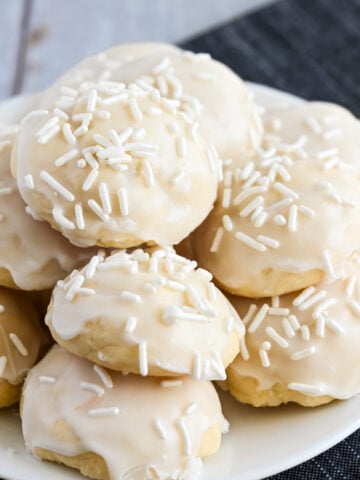 Baked Italian wedding cookies with elegant sprinkles.