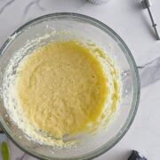 Combining the creamed butter and dry ingredients.