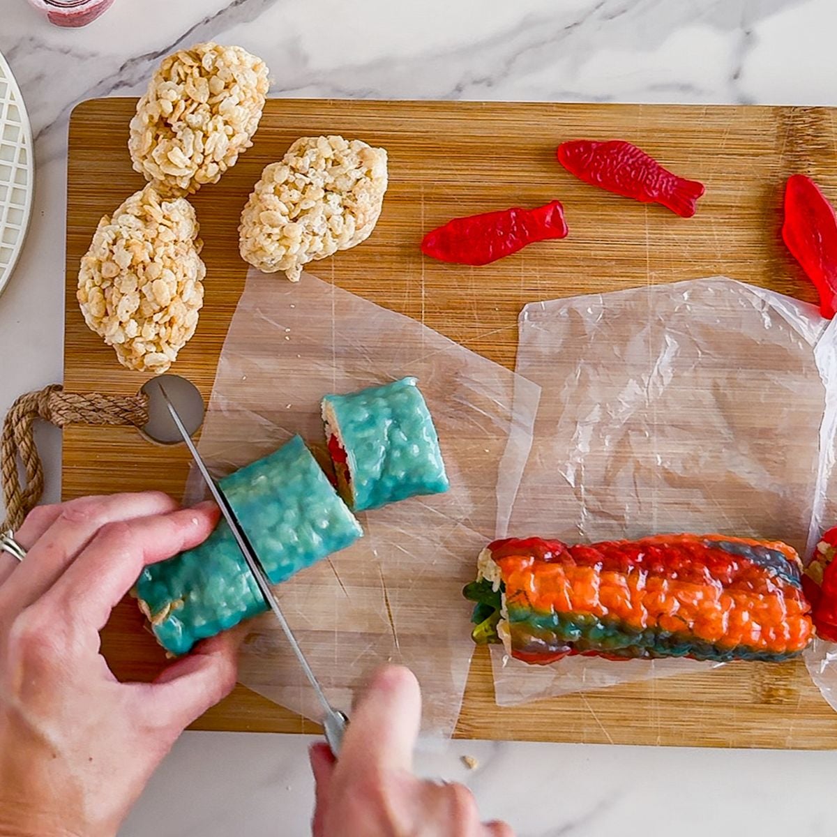 Cutting the sushi candy.