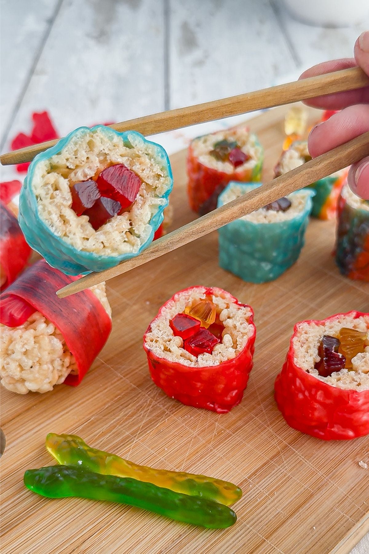 Chopsticks with sushi candy.
