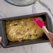 Spreading the dough.