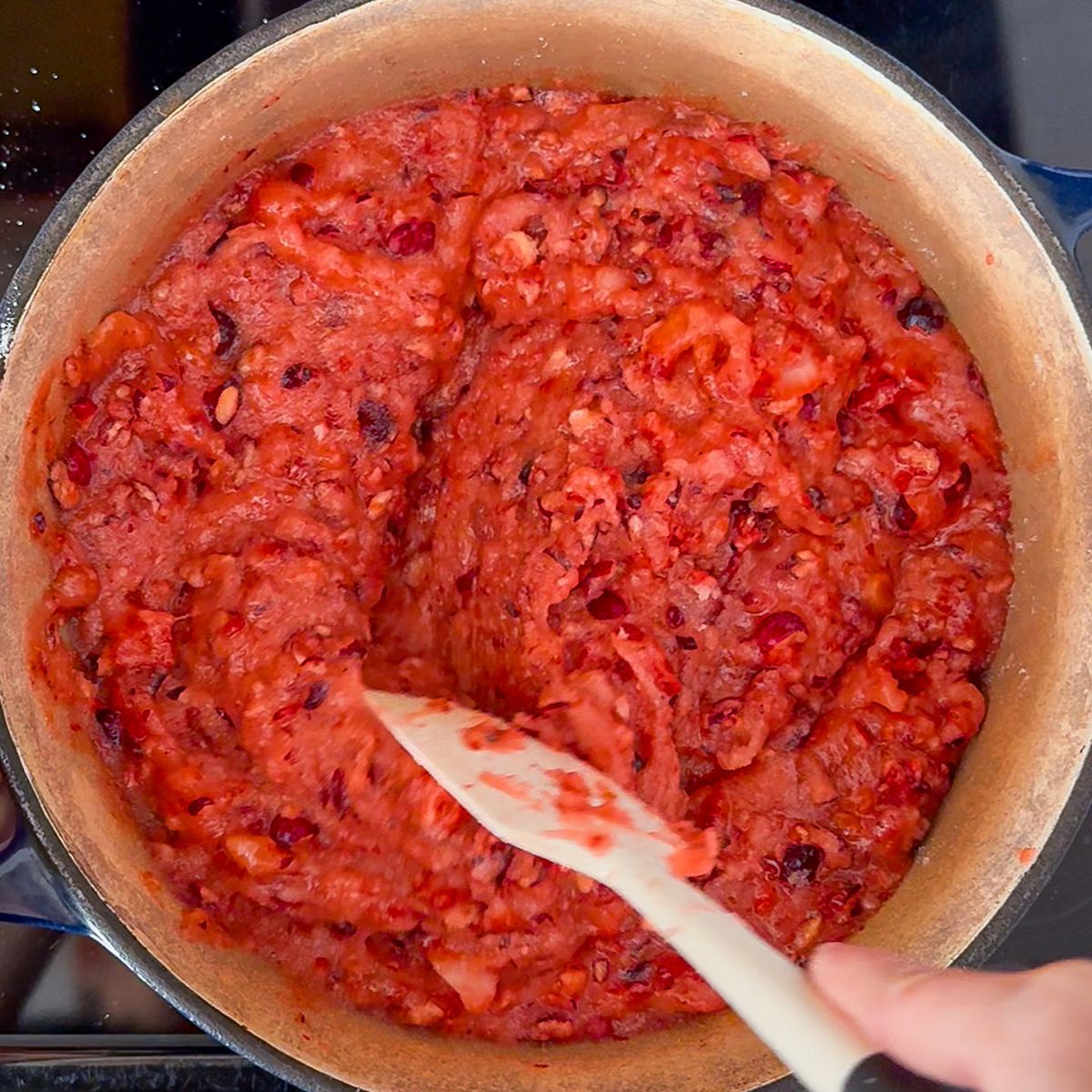Cooking the fruit for jam.