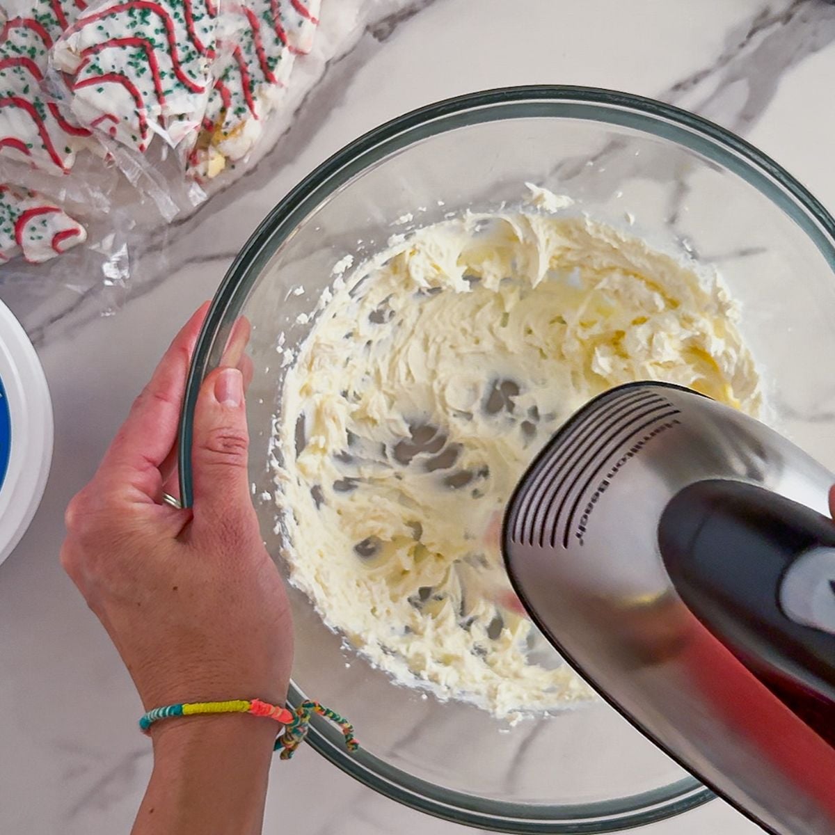 Softened cream cheese in a bowl.