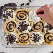 Adding the frosting and cookies.