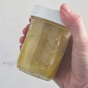 Shaking the ingredients together.