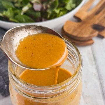 Jar of copycat chipotle honey vinaigrette.