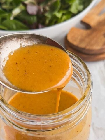 Jar of copycat chipotle honey vinaigrette.