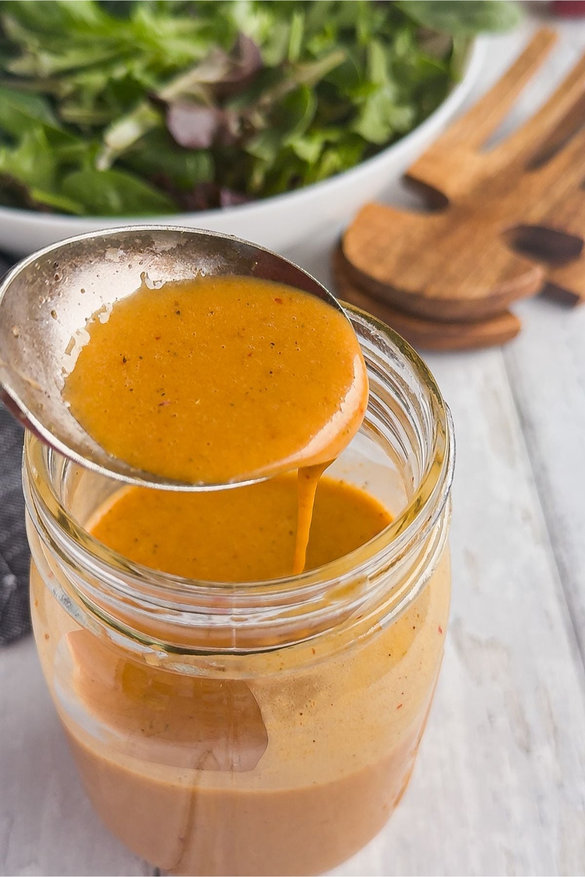 Jar of copycat chipotle honey vinaigrette.