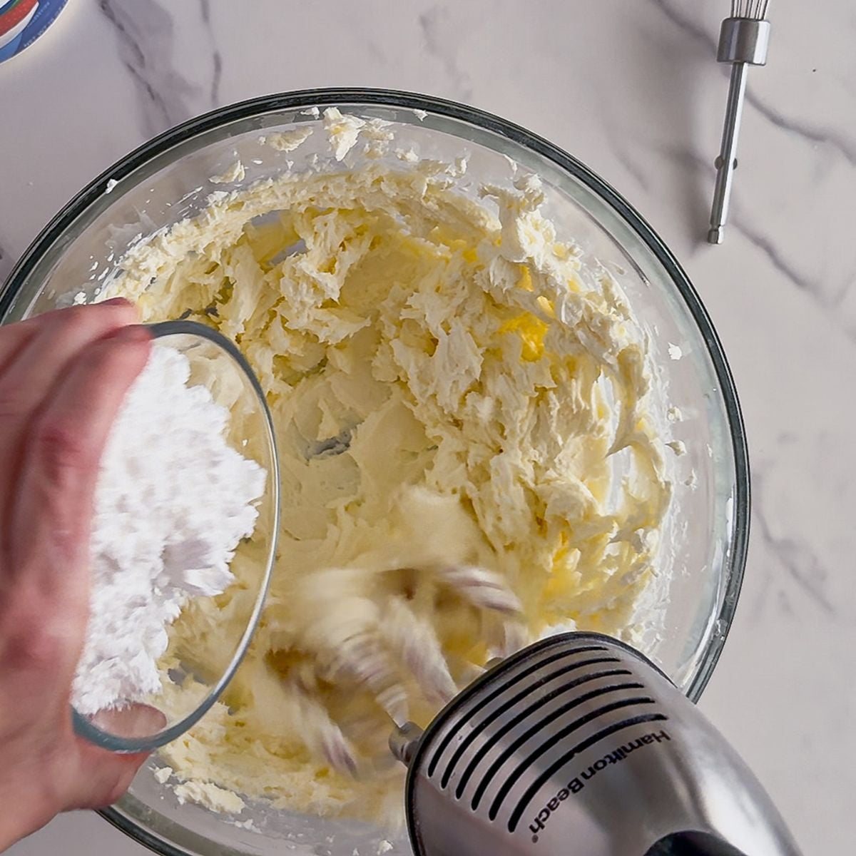 Mixing the soften cream cheese.