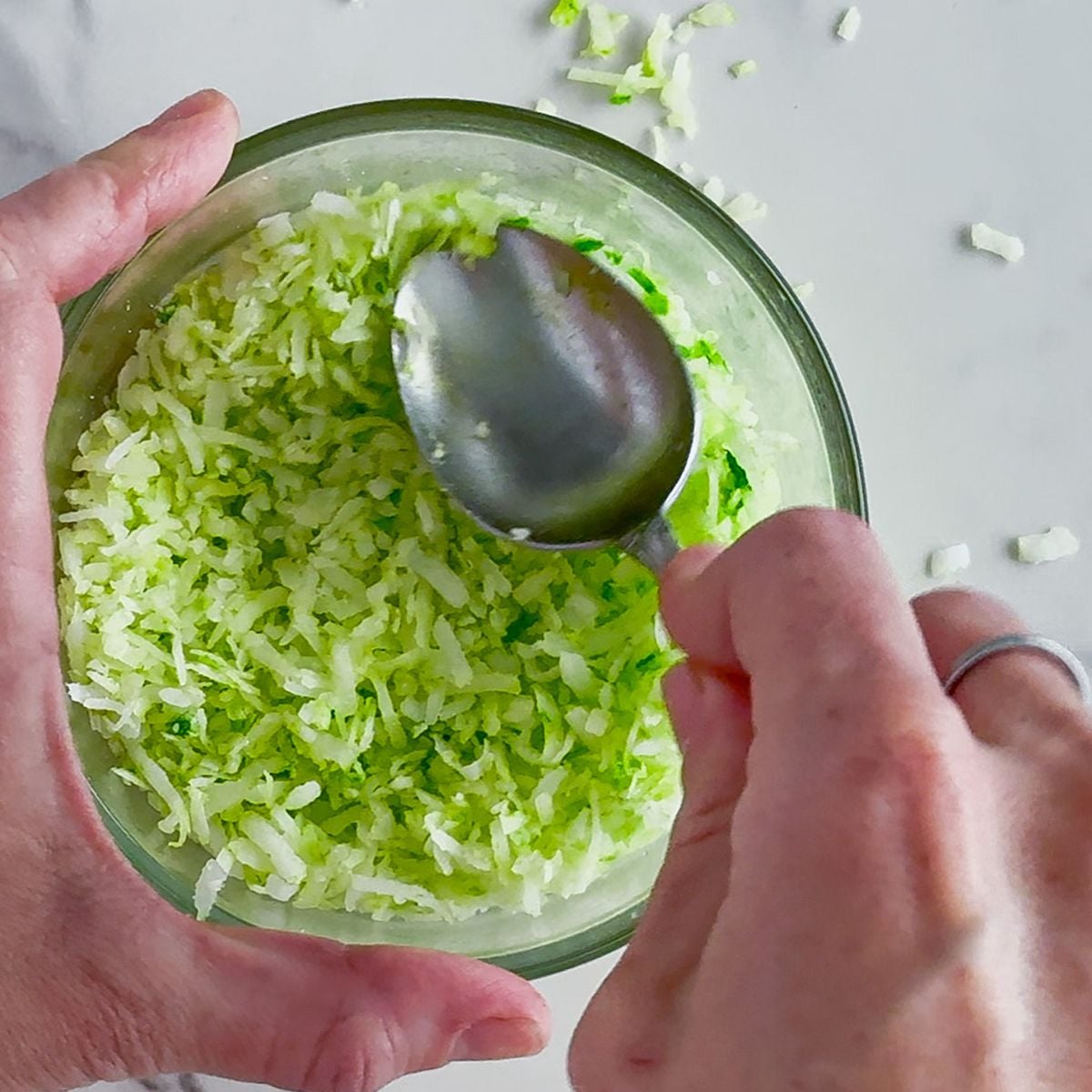 Dying the coconut green.