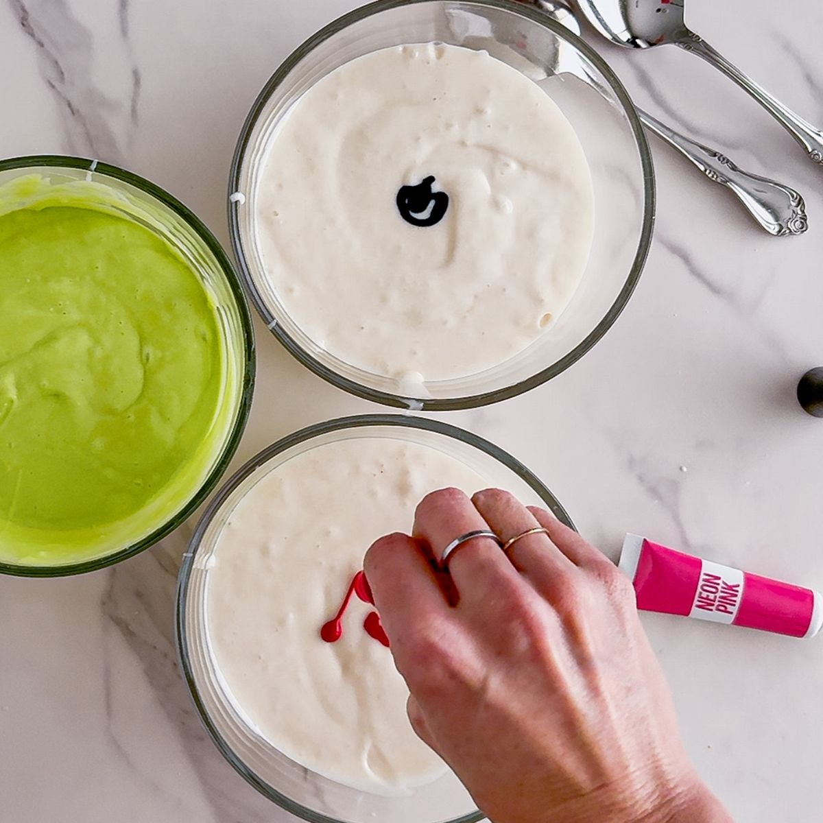 Adding dye to poke cake.