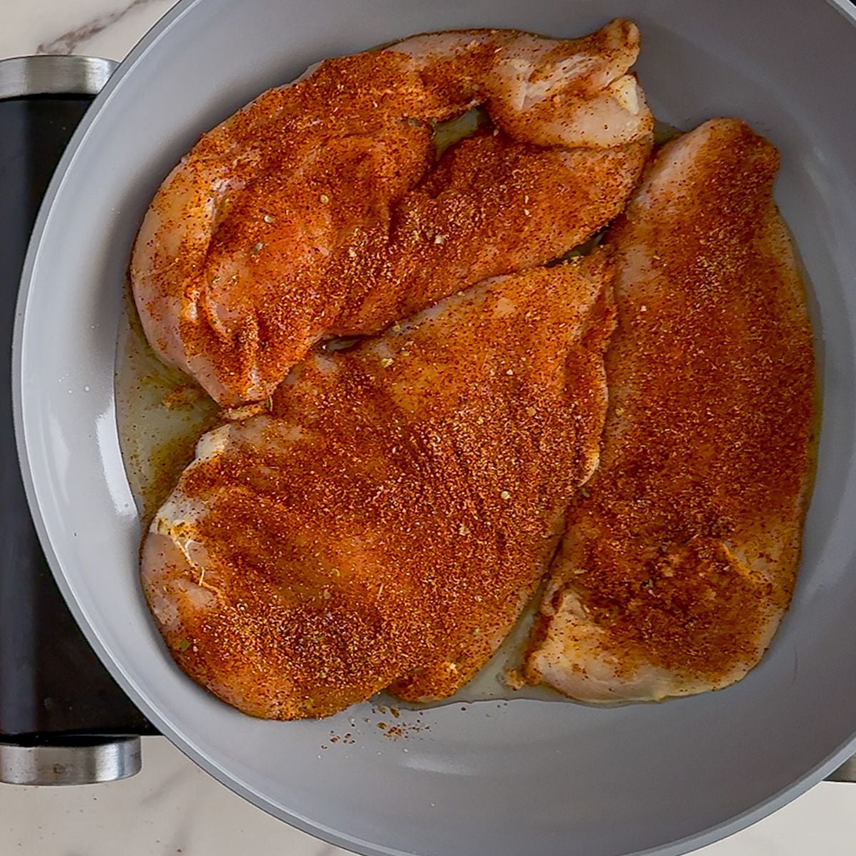 Seasoning southwest chicken.