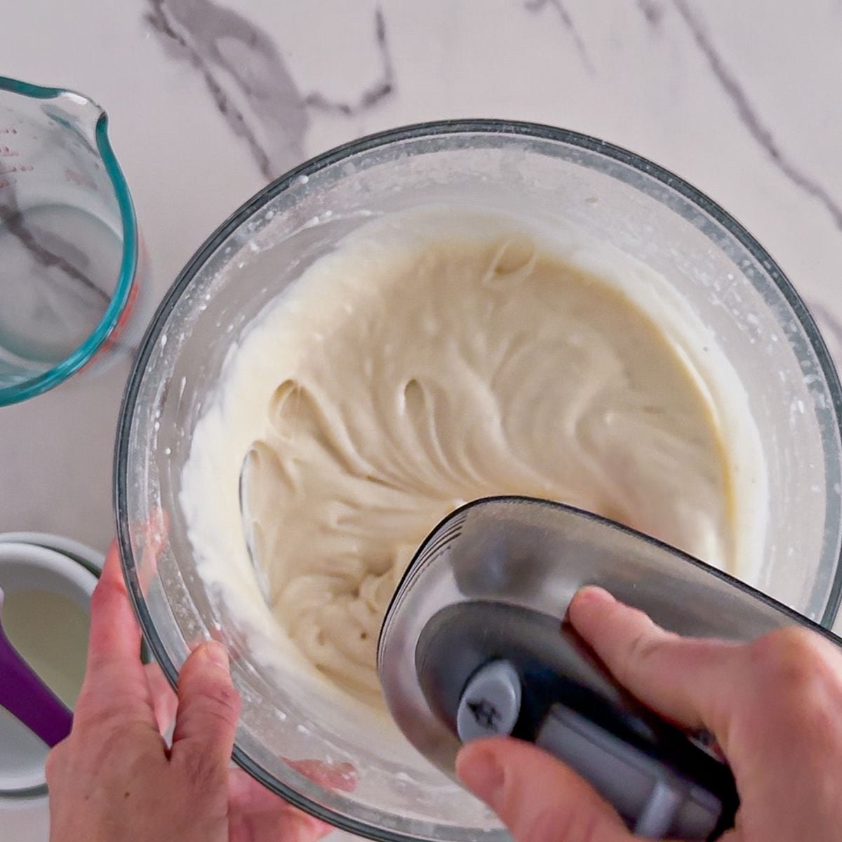 Mixing the whipped cream.