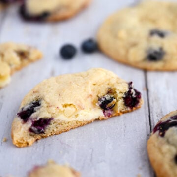 Half of a blueberry cheesecake cookie.