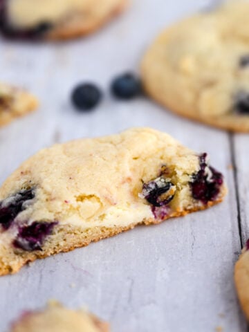 Half of a blueberry cheesecake cookie.