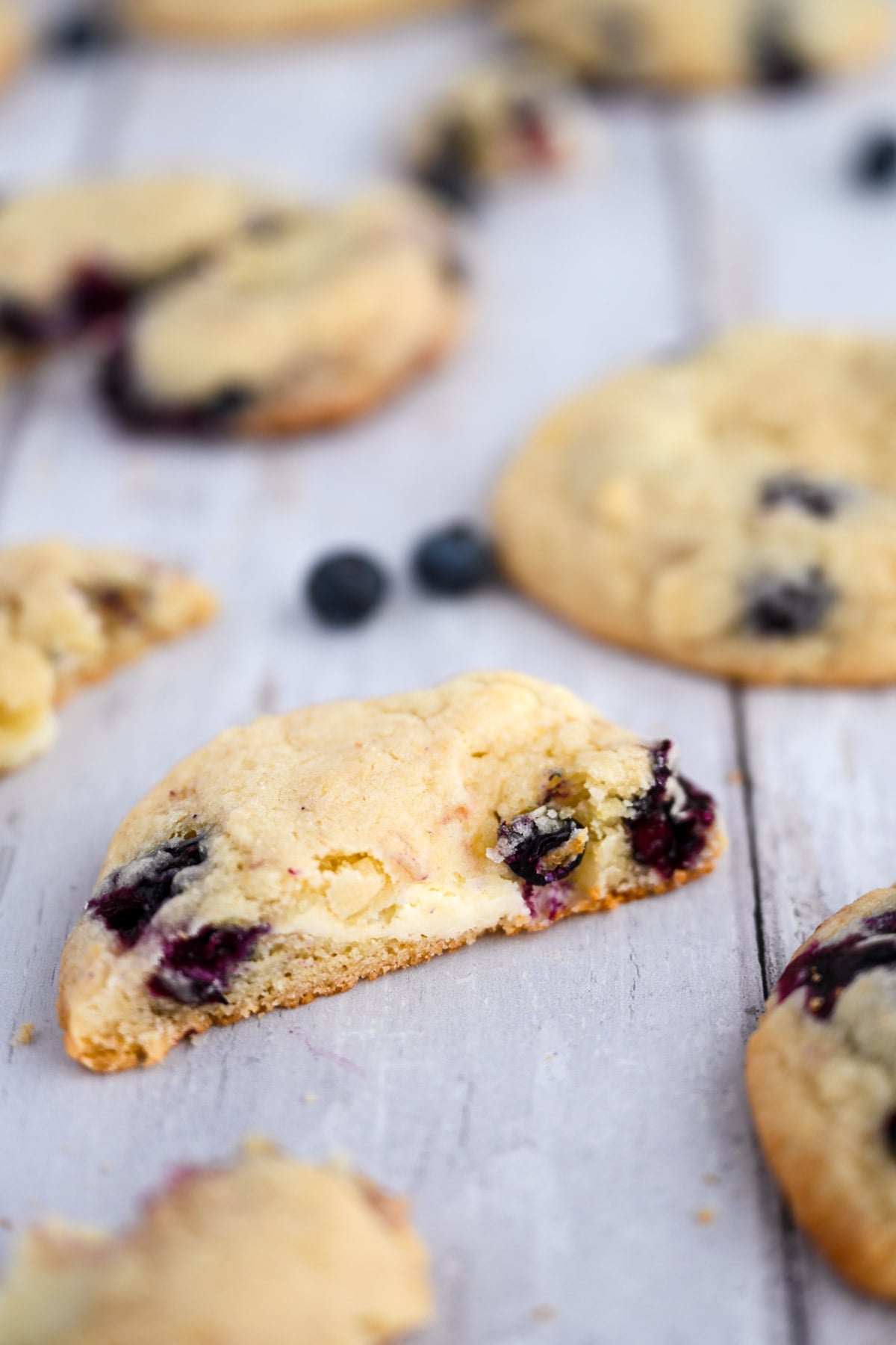 Half of a blueberry cheesecake cookie.