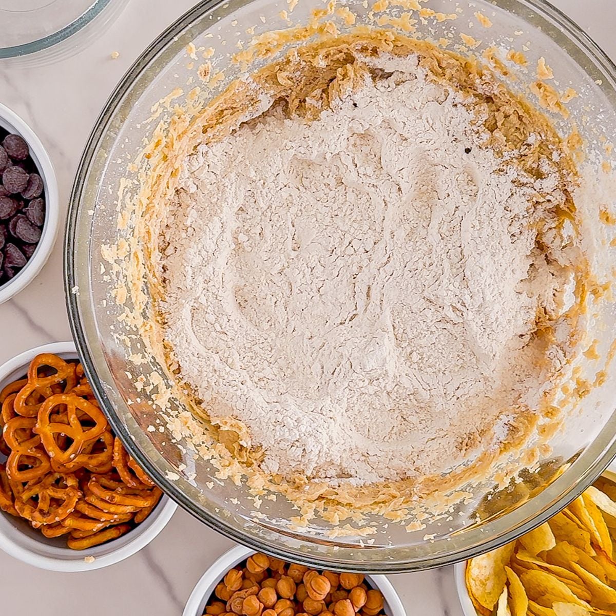 Mixing the dry ingredients in a bowl.